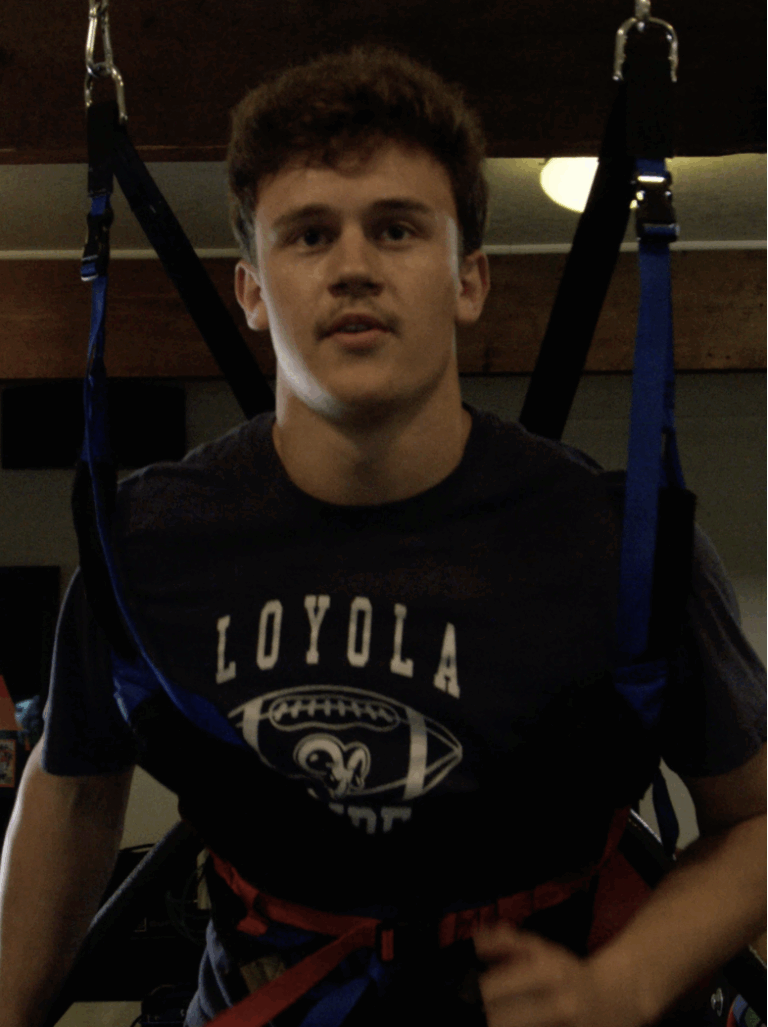 athlete performing spinal stabilization exercise in Missoula at Electric Rehab & Fitness to improve core strength and posture